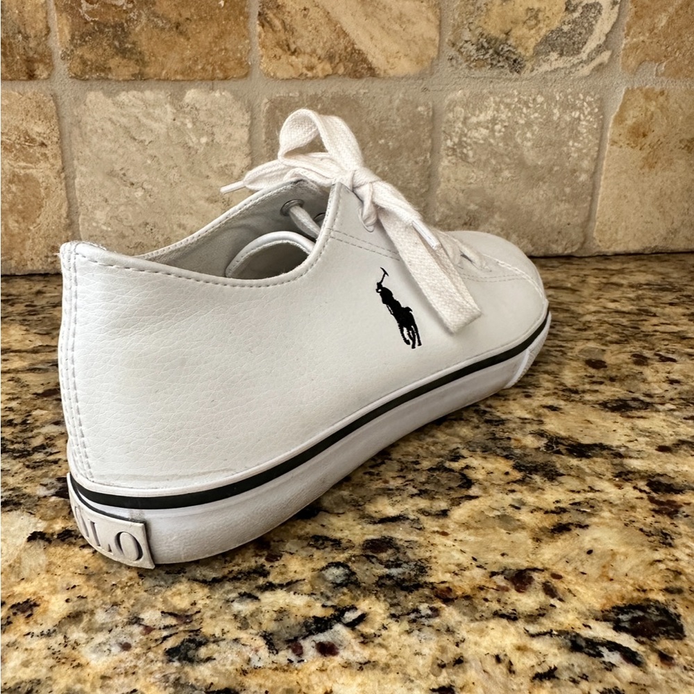 New Ralph Lauren Polo sneakers were gifted to me and did not fit.